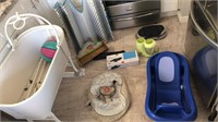 Lot of baby stuff including a bassinet