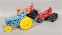 Three Vintage Auburn Rubber Co. Tractor Toys