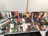 Tote of laserdiscs, lethal weapons, my fair lady,