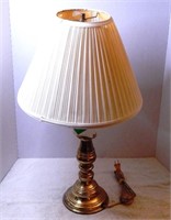 Table lamp with gold trim, works