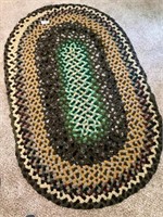 Braided oval rug 60” x 38”