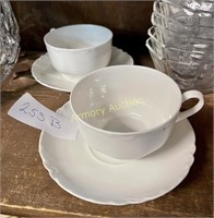 GERMAN PORCELAIN CUPS AND SAUCERS
