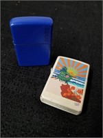 Two vintage Zippo lighters
