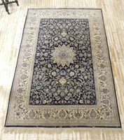 Hand Knotted Blue Wool Rug.