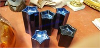 Blue star shaped candle holders