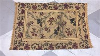 Brown carpet with red floral pattern