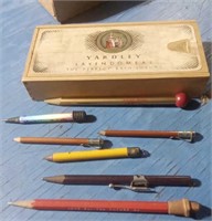7 ADVERTISING PENCILS IN A WOOD SOAP BOX