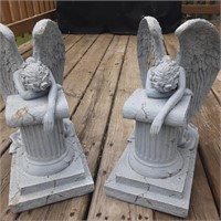 pair of matching garden statues