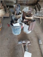 Four buckets of concrete tools - trowels and other
