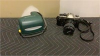 Nikon and Polaroid cameras