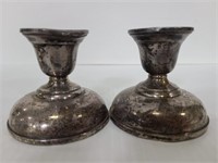 Pair of Sterling weighted reinforced candlesticks