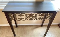 Wooden Table With Cast Metal Scroll Decoration