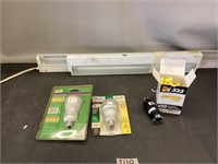 Portable cabinet light and lightbulbs