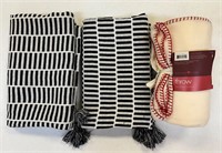 2 Black and White Throws and 1 Fleece Throw