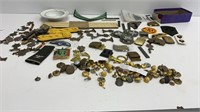 Box of military and related insignia, buckles,