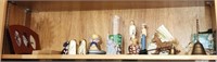 Shelf lot of misc. figurines bells and more