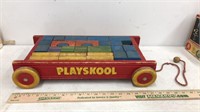 Playskool wooden pull wagon full of blocks