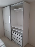 Large clothing cabinet with sliding doors and