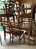 Table, 12 chairs, 3 leaves