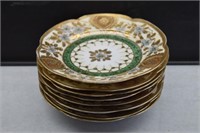 8 Oriental Hand Painted and Gilded Plates