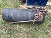 Piece of rubber and antique cow stanchion