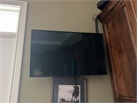 Insignia TV, mounted in Kitchen
