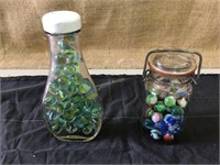 Vintage Marbles in collectible jars, (Ben