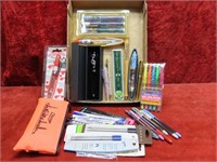 New packs of pens, writing instruments.