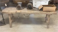Meat grinder on vintage bench
