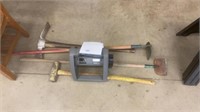Long handled tools and hose reel