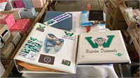 Waterloo Diamonds bleacher seat, binder, book