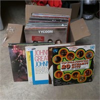 Assorted Vinyl Records in Sleeves