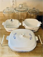4 Corning ware casserole dishes 2 with covers ,