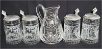 Group of etched crystal beer steins and crystal