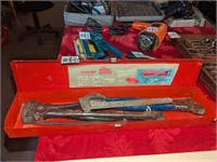 Fencing pliers, snips, wrench in tool box