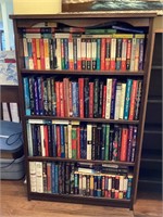 Assorted books and book shelf