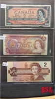 sheet with 3 Canadian $2 bills