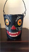 One Halloween double side cat face candy bucket,