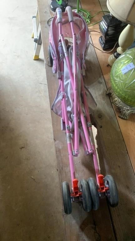 Pink kids stroller