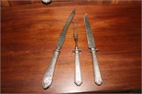 Sterling handled carving set and an additional