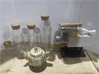 Glass bottles , tea pot, electric grinder