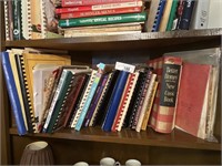 Collection of vintage and local cookbooks