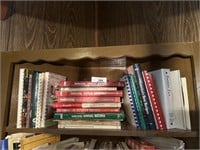 Collection of vintage and local cookbooks