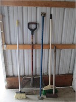 snow shovel, brooms, cargo bar