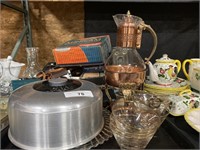 Cake tray, copper canteen, sherbet bowls.