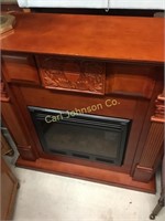 ELECTRIC FIREPLACE IN HEARTH