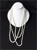 4 STRANDS OF PEARLS: 2 CULTURED AND 2 BAROQUE