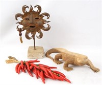 An iron cast sun, Wood Iguana and more