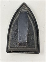 Vintage cast-iron sad iron with a metal iron