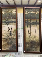 2 large framed tree prints with a reflection in